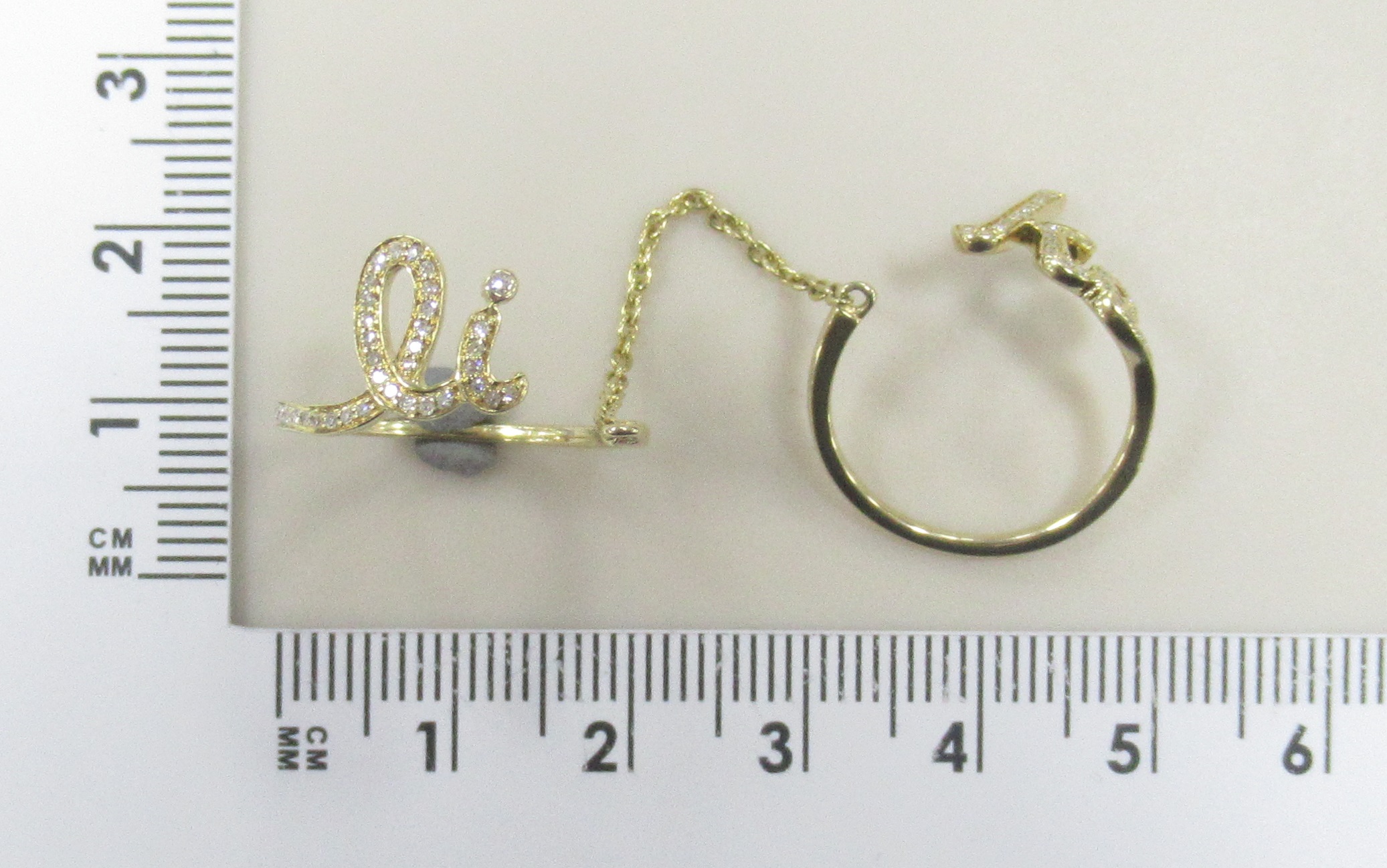 Незамкнутое кольцо из желтого золота с бриллиантами 2 в 1